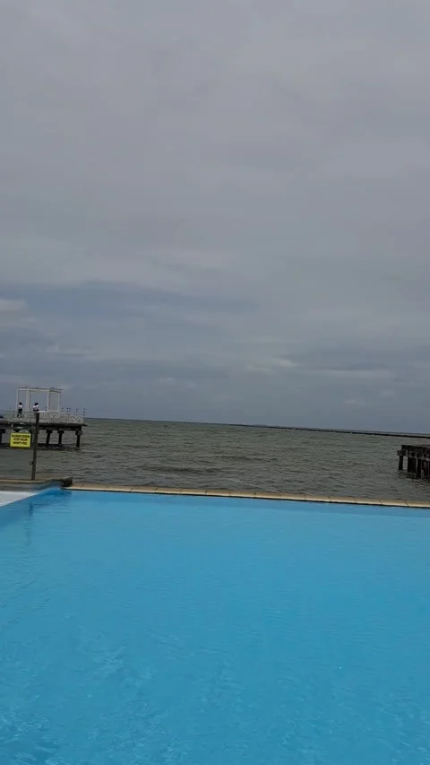 Infinity Pool Overlooking the Ocean Stock Footage 331411638