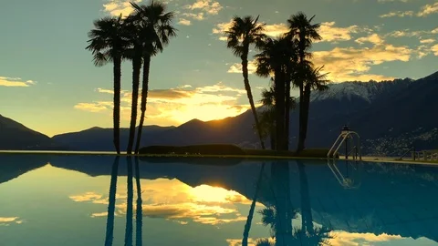 Infinity Pool with Palm trees and Mountain Видео 115764673