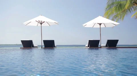Infinity pool with parasols Stock Footage 1008828