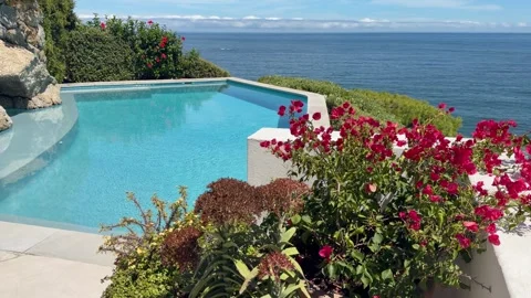 Infinity Pool in a plush home over looking the Ocean. Stock Footage 331607815
