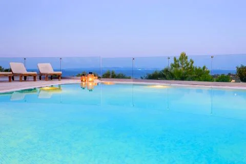 Infinity pool with sea view Stock Photos