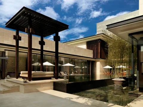 Infinity pool surrounded by modern building Foto stock