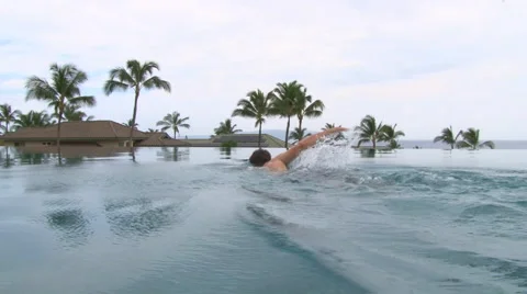 Infinity Pool Swimmer Stock Footage 63617652