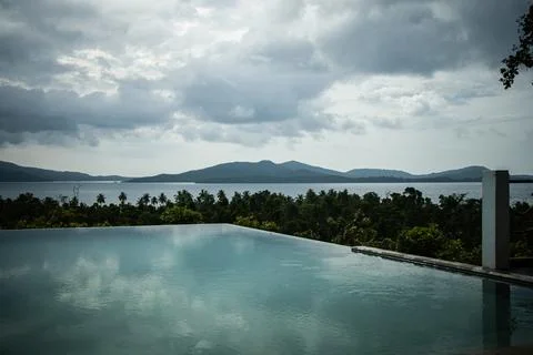 Infinity pool in tropical destination Stock Photos