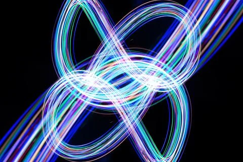 Infinity sign, drawing by light, flash of light in infinity. Stock Photos