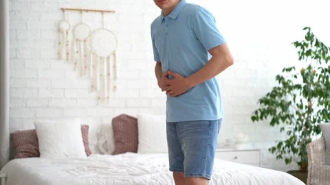 Inflammation of appendicitis, stomach ulcer, bloating, man with abdominal pain Vídeos de archivo 284015576