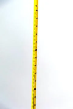 Inflammation test. Mercury high temperature thermometer yellow Stock Photos
