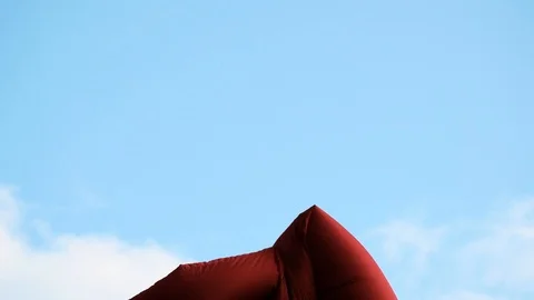 Inflatable aeroman pipe, dancing over a blue sky. Stock Footage 120510626