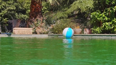 Inflatable Ball On The Pool Stock Footage 115326805