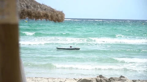 Inflatable beach bed at sea Stock Footage 128351871