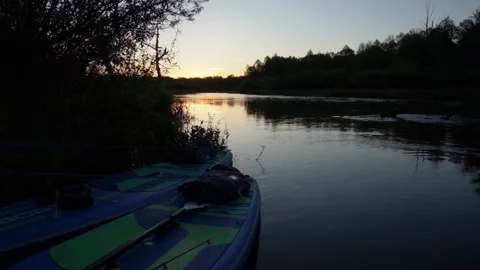 Inflatable boards for rowing at sunset, Stock Footage 132910732