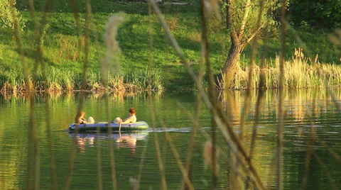 Inflatable boat in lake Stock Footage 23195874