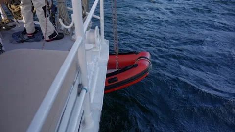 Inflatable Boat Launch from Sailing Ship in Beagle Channel Stock Footage 331940399