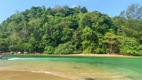 An inflatable boat sails through a beautiful area. Video stock 239522682