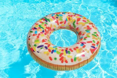 Inflatable circle donut floats in the pool Stock Photos