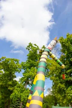 Inflatable clown develops against the blue sky Stock Photos