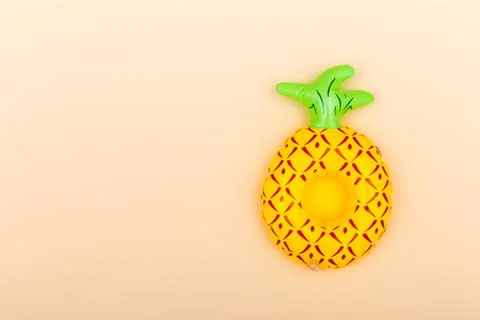 Inflatable cup holder on an orange background with copy space Stock Photos