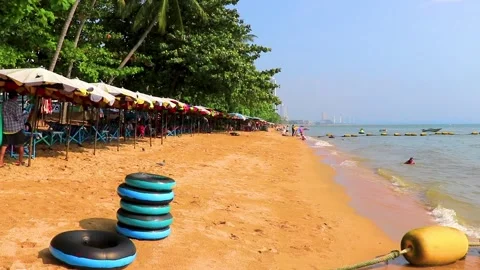 Inflatable floating tires on the beach in Pattaya Thailand. Stock Footage 309544205