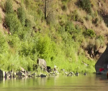 Inflatable flyfishing trip boat medium on calm of River Stock Footage 21652848