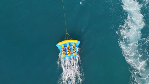 Inflatable flying fish on the sea Stock Footage 125412720