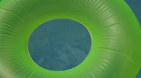Inflatable green pool ring Stock Footage 23685708