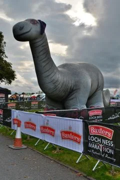 Inflatable Nessie, at the finish line of Loch Ness Marathon Stock Photos