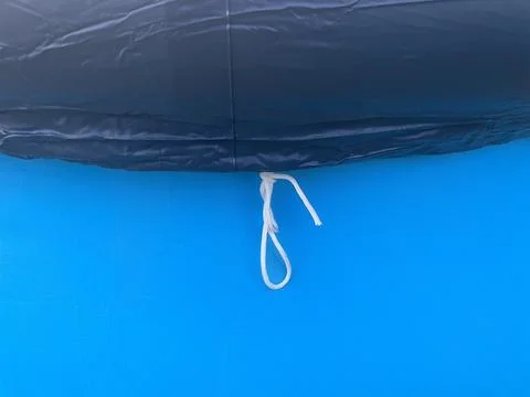 Inflatable pool set up outside city Stock Photos