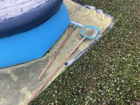 Inflatable pool set up outside city Stock Photos