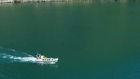 Inflatable raft navigating norway Stock Footage 69994188