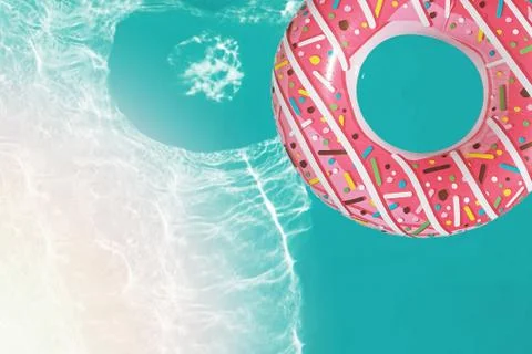 Inflatable ring of donut shape floating in the swimming pool, Stock Photos