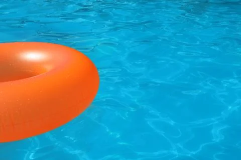 Inflatable ring floating in swimming pool on sunny day. Space for text Stock-Fotos