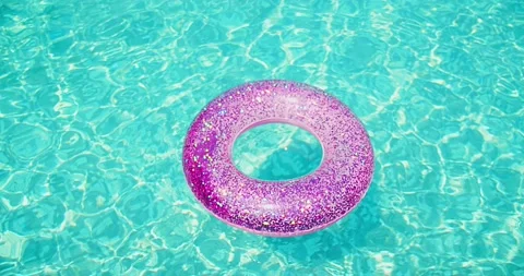 Inflatable ring for swimming pool, Pink Swimming Ring Circle pool Floats Stock Footage 201406926