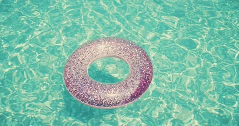Inflatable ring for swimming pool, Pink Swimming Ring Circle pool Floats Stock Footage 229281433