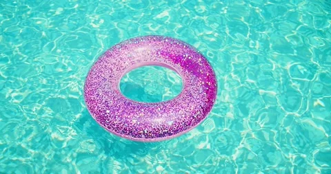 Inflatable ring for swimming pool, Pink Swimming Ring Circle pool Floats Color Stock Footage 232696114