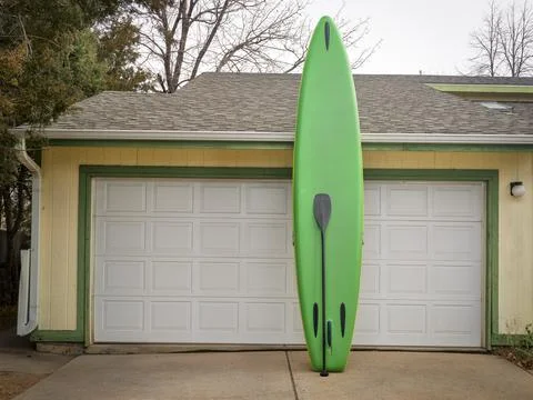Inflatable stand up paddleboard with paddle Stock Photos
