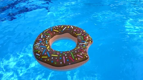 Inflatable tube in the form of a donut in the pool Vidéo 119236416