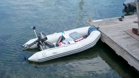 Inflatable Zodiac Dinghy Moored at a Pier in Narragansett, RI 6-16-2026 Stock Footage 337188343