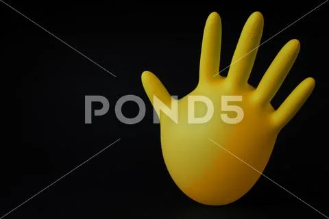 Inflated sterile medical glove on black background Stock Photos