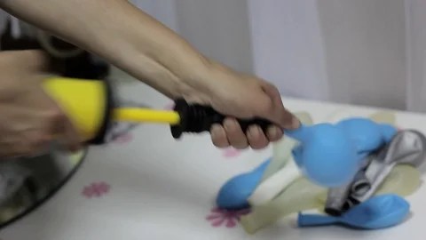 Inflating balls with an air pump Stock Footage 93025256