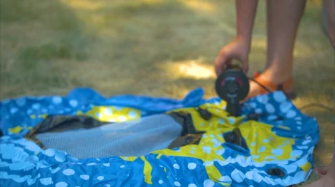 Inflating an Inner Tube at a High Frame Rate Stock Footage 92631477