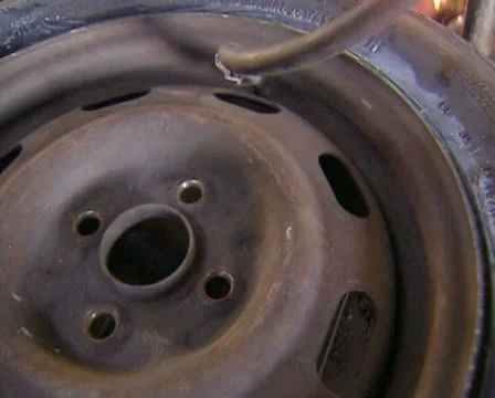 Inflating a tire Stock Footage 20510698