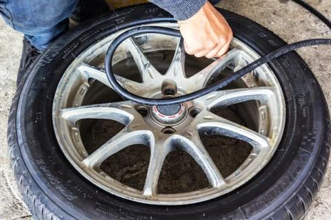 Inflating tires Stock Photos
