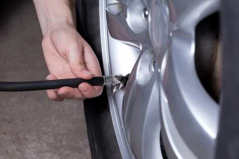 Inflating the wheels Stock Photos