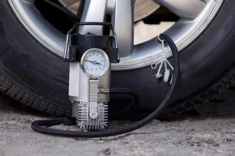 Inflating the wheels Stock Photos