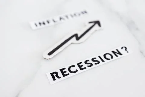 Inflation with arrow going up and recession texts with question mark undernea Stock Photos