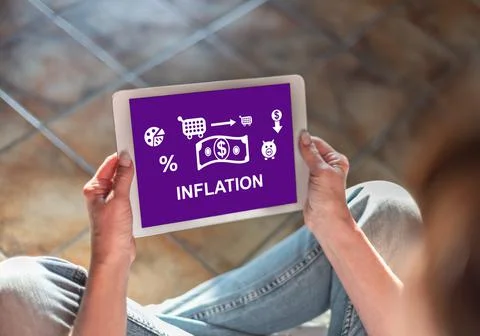 Inflation concept on a tablet Stock Photos