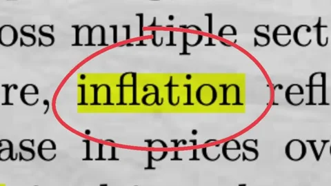 Inflation Highlighted in Newspaper Article Economic Crisis and Rising Prices Stock Footage 334794782