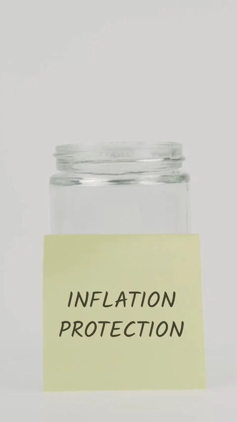 Inflation protection text or word on yellow sticky note attached to jar Stock Footage 311743705