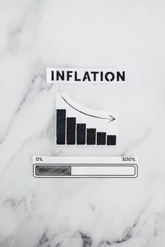 Inflation rates going down, text with graph showing stats decreasing and pr.. Stock Photos