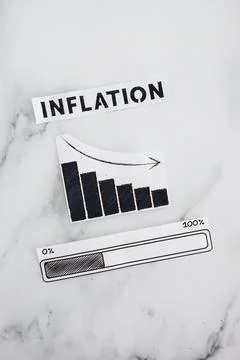 Inflation rates going down, text with graph showing stats decreasing and pr.. Stock Photos